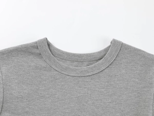 Close-up of the ribbed crew neck and stitching on this gray modal stretch athletic t-shirt