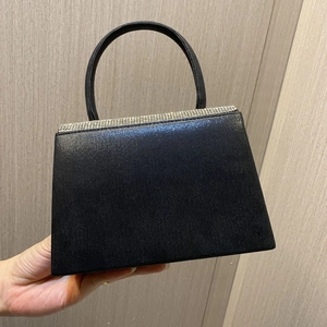 Elegant black rhinestone evening handbag for weddings featuring a satin trapezoid design