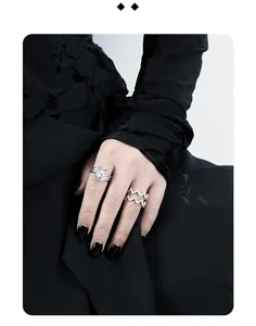 Detailed view of S925 silver rings with large round zircon and wavy pavé diamond band