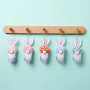 Set of 5 Easter gnome plush hanging ornaments with bunny ears on mint background