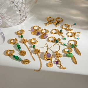Golden stainless steel earrings with natural stones and assorted celestial charms