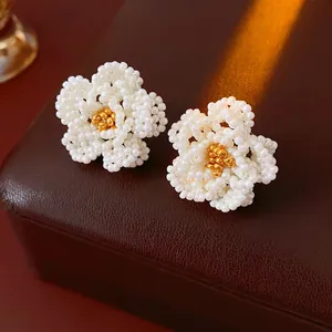 French vintage white beaded camellia flower stud earrings with gold center accent