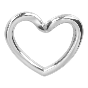 Macro shot of a polished silver heart-shaped stainless steel jewelry pendant accessory