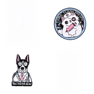Cartoon animal doctor enamel pins set featuring cute cats and dogs in medical scrubs