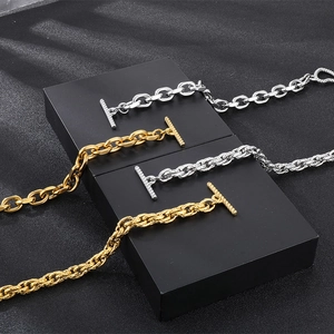 Detail of stainless steel O-chain bracelets with toggle clasp in gold and silver finish