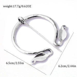 Detailed view of silver viking brooch dimensions and weight showing intricate leaf design