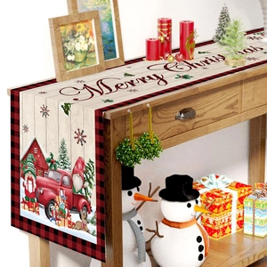 Christmas table runner with gnome and red truck design on rustic wood background