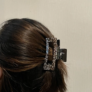 Classic leopard print rectangular hair claw clip for elegant women styling and updo