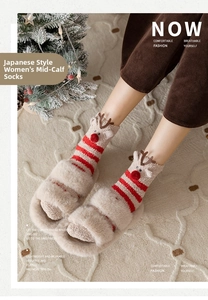 Winter Christmas socks with 3D reindeer design and plush home slippers in festive setting