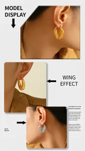 Macro detail of 18K gold and silver plated feather wing hoop earrings on model