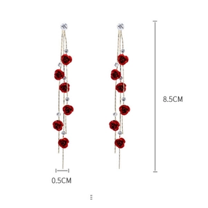 Detail shot of long red rose tassel earrings with rhinestones measuring 8.5CM in length