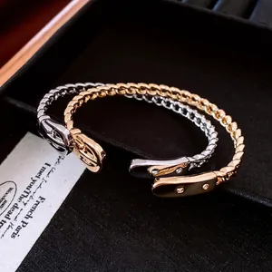 18K gold plated chain bangle with buckle closure in gold and silver finishes