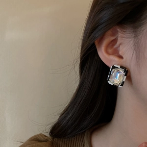 Chic geometric square earrings with black and white acrylic and large crystal on model