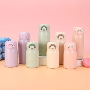 Detailed group shot of mini stainless steel vacuum flasks in four pastel macaron colors