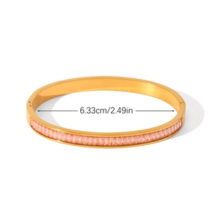 Detail view of 18K gold stainless steel bangle with 6.33cm inner diameter measurement