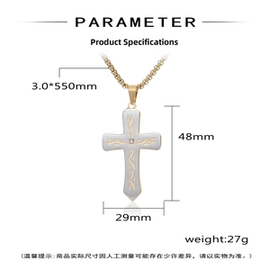 Detailed view of two-tone stainless steel cross pendant with diamond inlay and dimensions