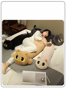 Detailed view of plush cat body pillows in black, grey, brown, and cream soft fabric