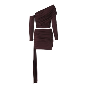 Detail of chocolate brown off-shoulder top and ruched mini skirt with side ribbon detail