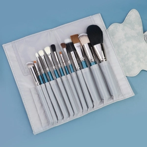 Set di 12 pennelli da trucco con manici blu glitterati e custodia grigia inclusa