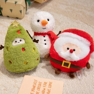 Plush Christmas toy set featuring Santa, snowman, and reindeer on a cozy carpet