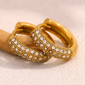 Macro shot of 18K gold plated hoop earrings with micro-pave white zircon inlay