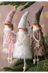 Three plush angel doll ornaments with gold wings hanging on a Christmas tree branch