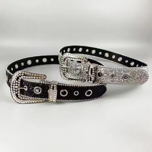 Sparkly rhinestone belts in black and silver with glitter finish and metal eyelets