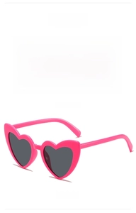 Detail view of heart-shaped sunglasses in rose red frame with gray lenses