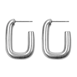 Detailed view of polished silver U-shaped stainless steel hoop earrings for women