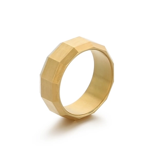 8mm gold brushed faceted stainless steel minimalist ring for men on white background
