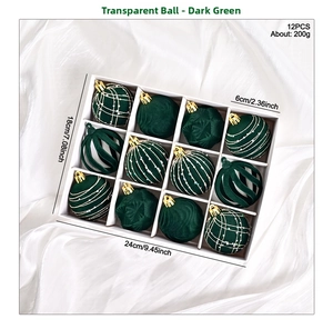 Close-up of 12 dark green velvet and glitter Christmas ornaments in a premium gift box