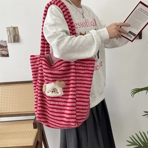Detail of soft striped plush tote bag with a cute cartoon dog patch and large capacity