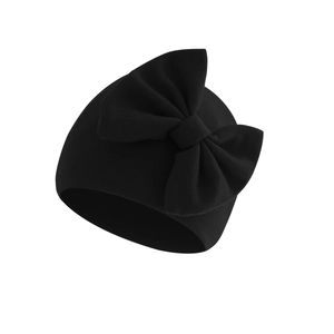 Detailed view of the ribbed knit fabric and oversized bow on this black baby beanie