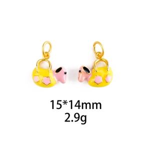 Detailed view of enamel giraffe charms in gold finish including size 15x14mm and weight 2.9g