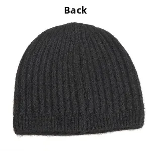 Detail view of the back of a thick black ribbed knit wool blend beanie for women
