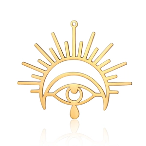 Detail view of golden stainless steel evil eye sun pendant with teardrop charm