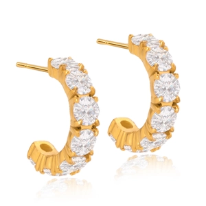 Detailed close-up of double-layer C-hoop earrings with sparkling cubic zirconia stones