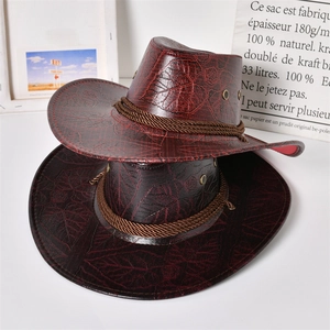 Dettaglio cappello da cowboy in pelle marrone scuro con goffratura a foglia e corda intrecciata