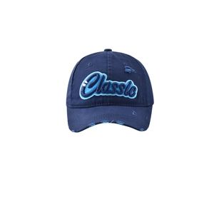 Detailed view of the 'Classic' embroidery on a vintage distressed navy baseball cap