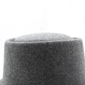 Close-up of grey wool felt bucket hat texture showing the thick and premium fabric finish
