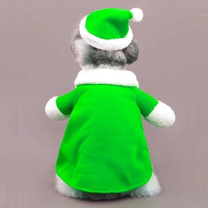 Detail of green fleece Christmas pet cape and hat with soft white faux fur trim