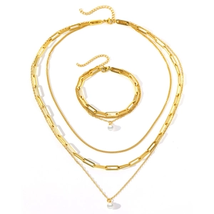 Three-layer gold chain necklace and bracelet set with elegant white pearl pendants