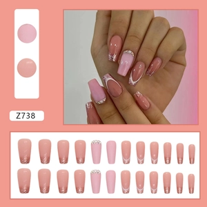 Long ballet press-on nails in gradient pink with glitter and pearl butterfly decor