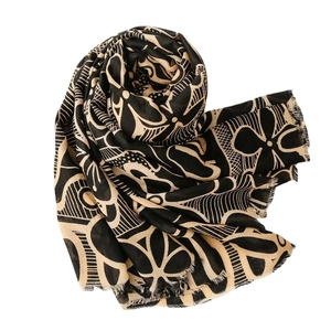 Black and beige floral cotton linen scarf with soft fringe tassels on white background