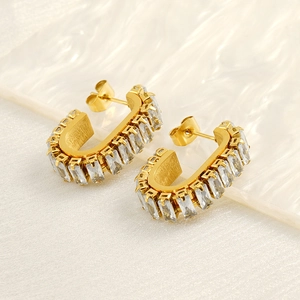 U-shaped gold earrings for women featuring rectangular cubic zirconia in a modern design