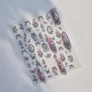 Shell luster nail art stickers with vintage floral patterns and French glass window design