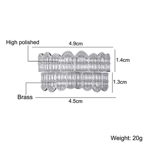 Detailed view of silver brass hip-hop grillz with high polished finish and full rhinestones