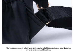 Close-up of reinforced precision stitching and golden metal buckle on black oxford backpack