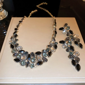 Dark luxury silver needle teardrop earrings and necklace set with blue crystals