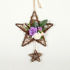 Star-shaped rattan hanging wreath with artificial purple and white roses for home decor